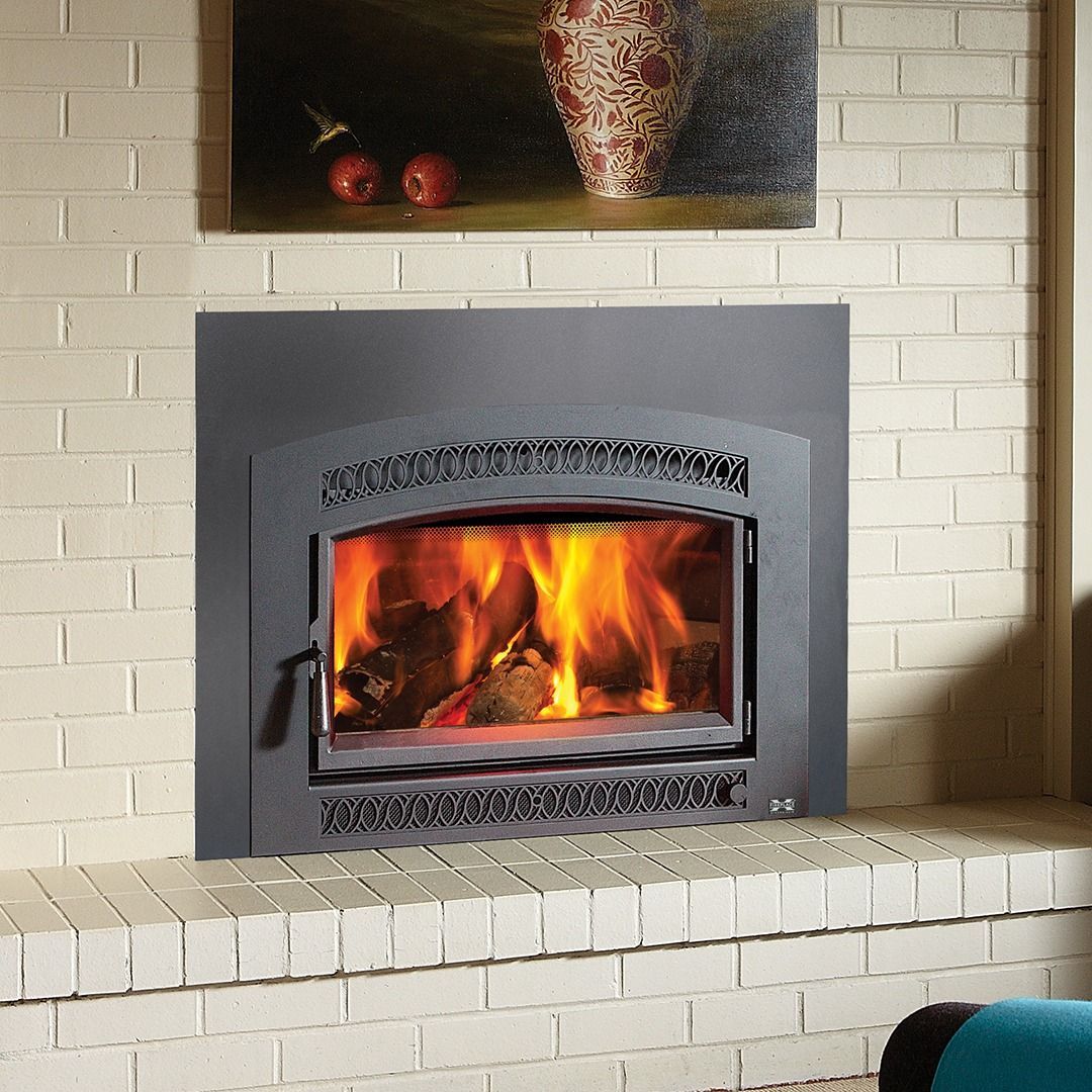 Fireplace with flames burning inside a brick setting.