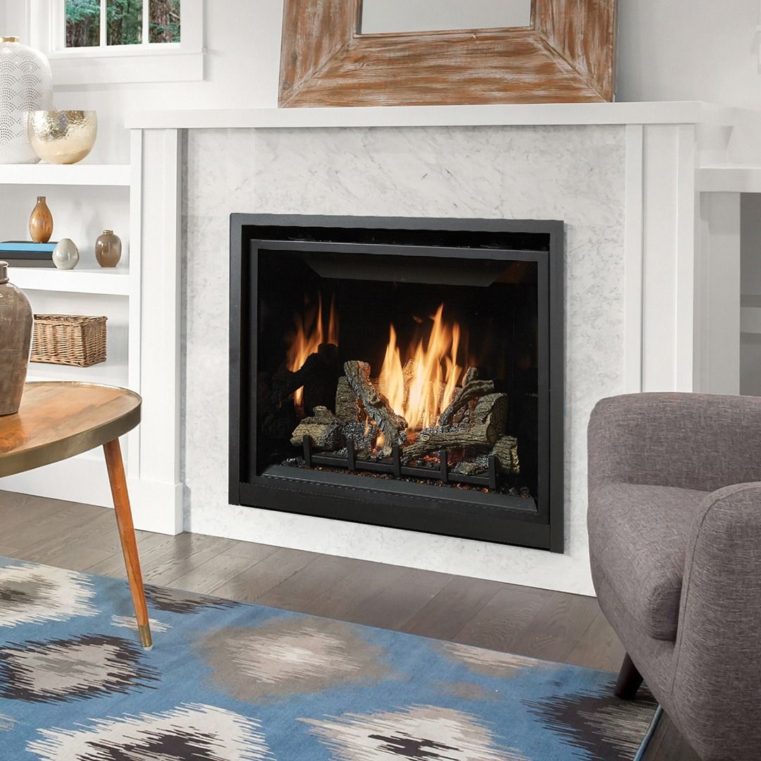 Gas fireplace with flames, built into a white mantel, in a living room.