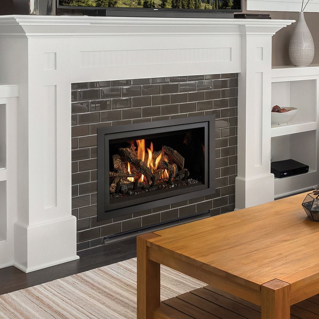 Fireplace with black brick surround, white mantel, and wooden coffee table.