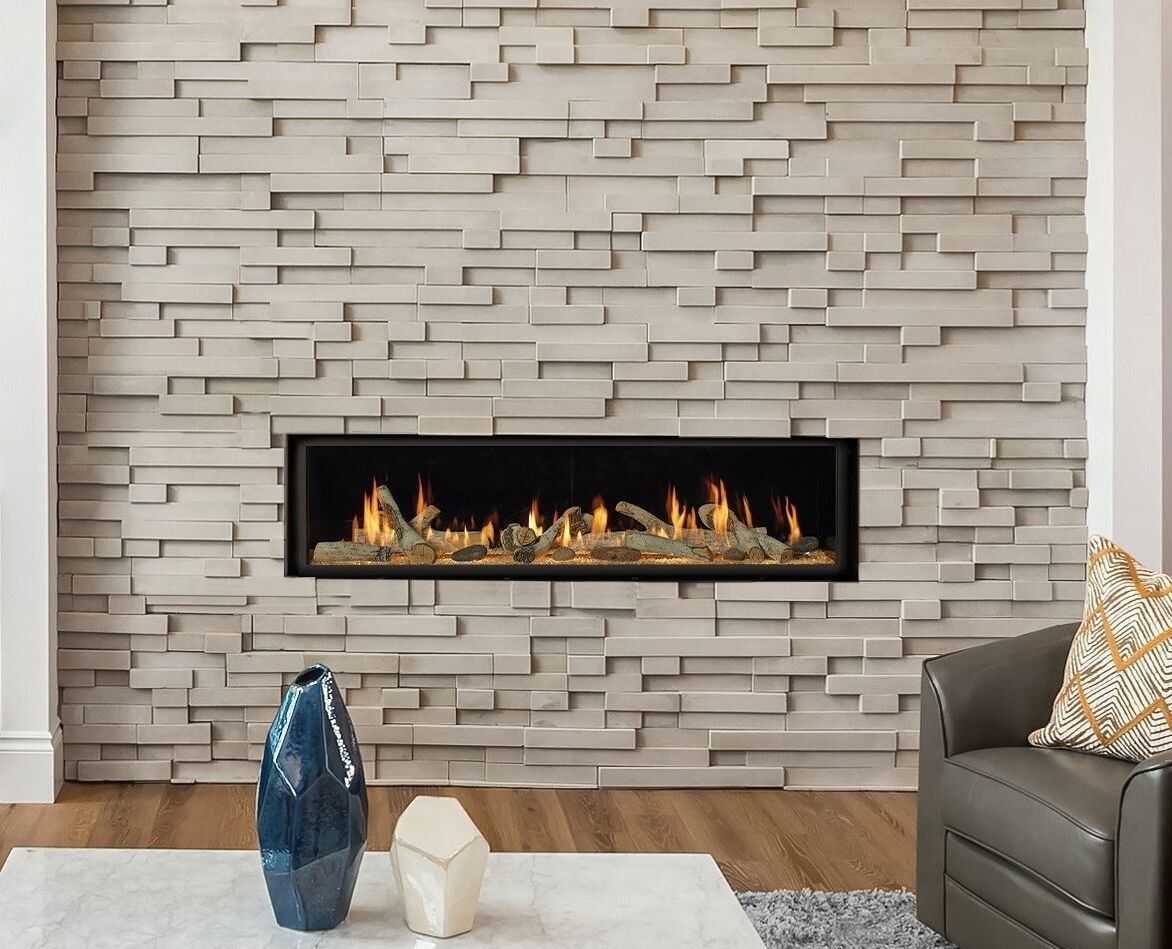 Fireplace in stone wall, flames inside a dark frame, with modern decor.