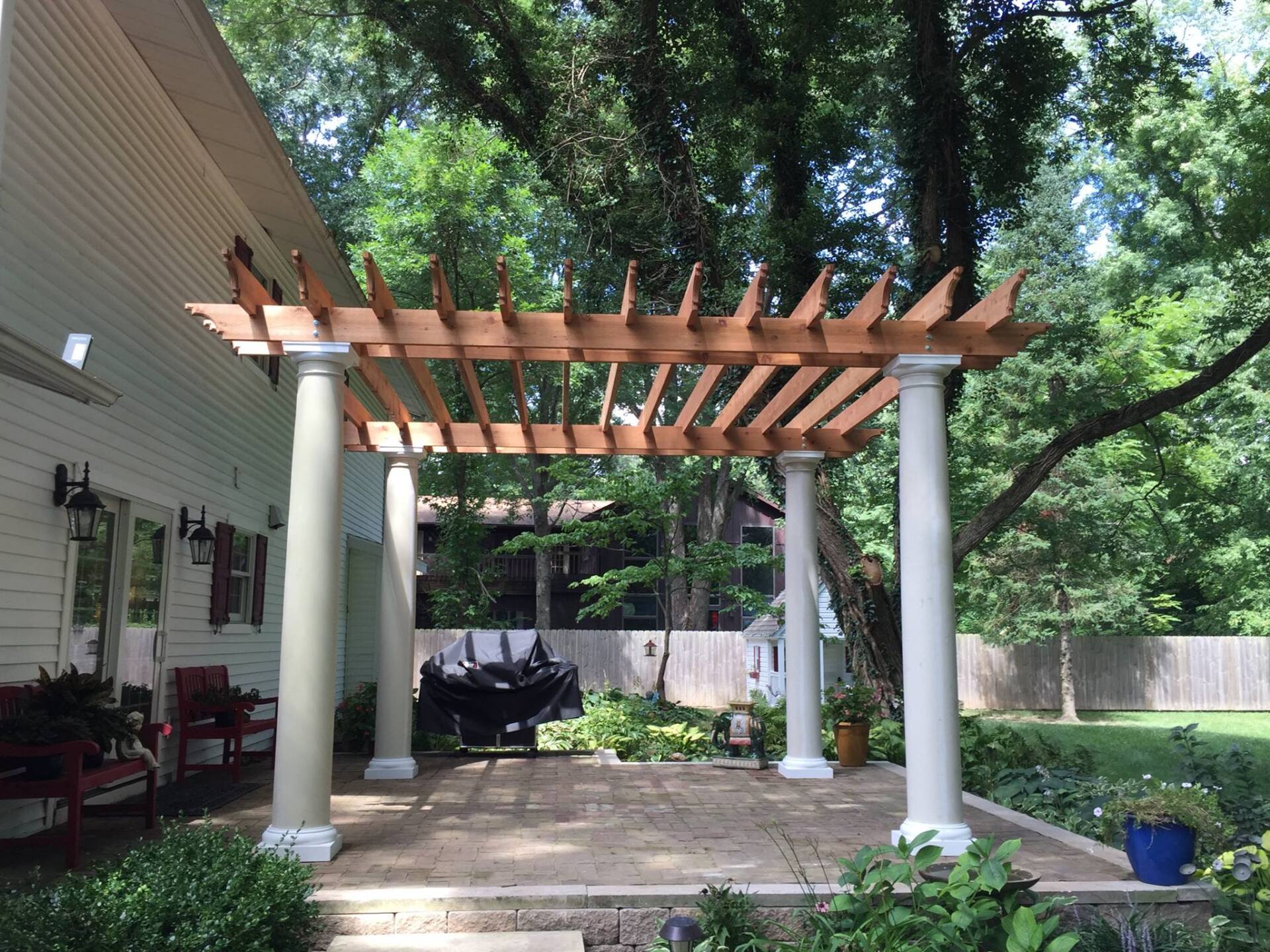 Pergola with white pillars