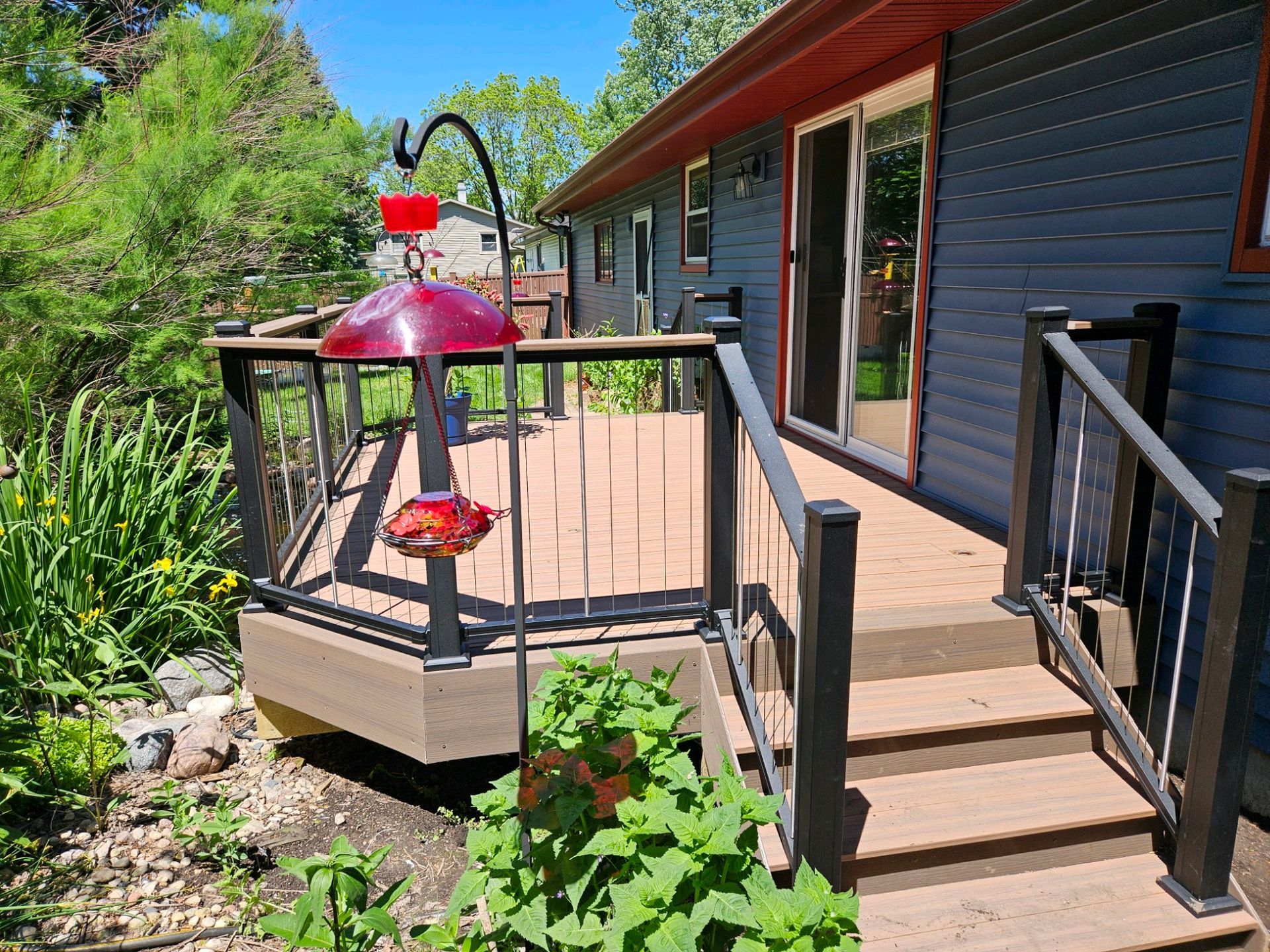 Side view of deck with bird feeders