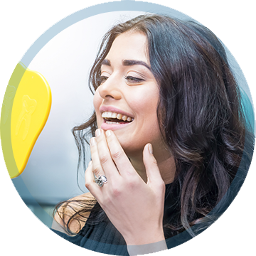 Woman checking her teeth