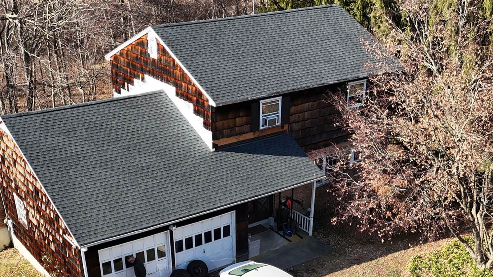 An aerial view of a house with new roof