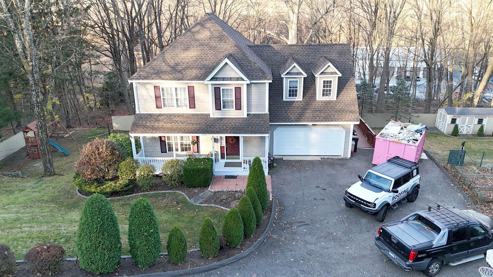 An aerial view of a beautiful house with new roof