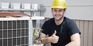 Smiling electrician