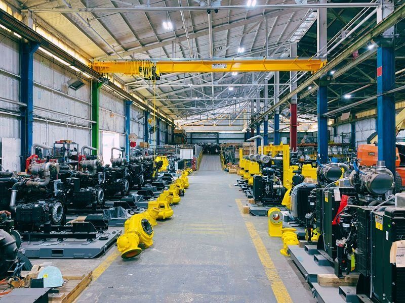 A large warehouse filled with lots of machinery and equipment.