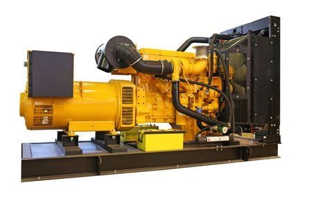 Yellow industrial generator set on a black steel base, with engine, alternator, and radiator.