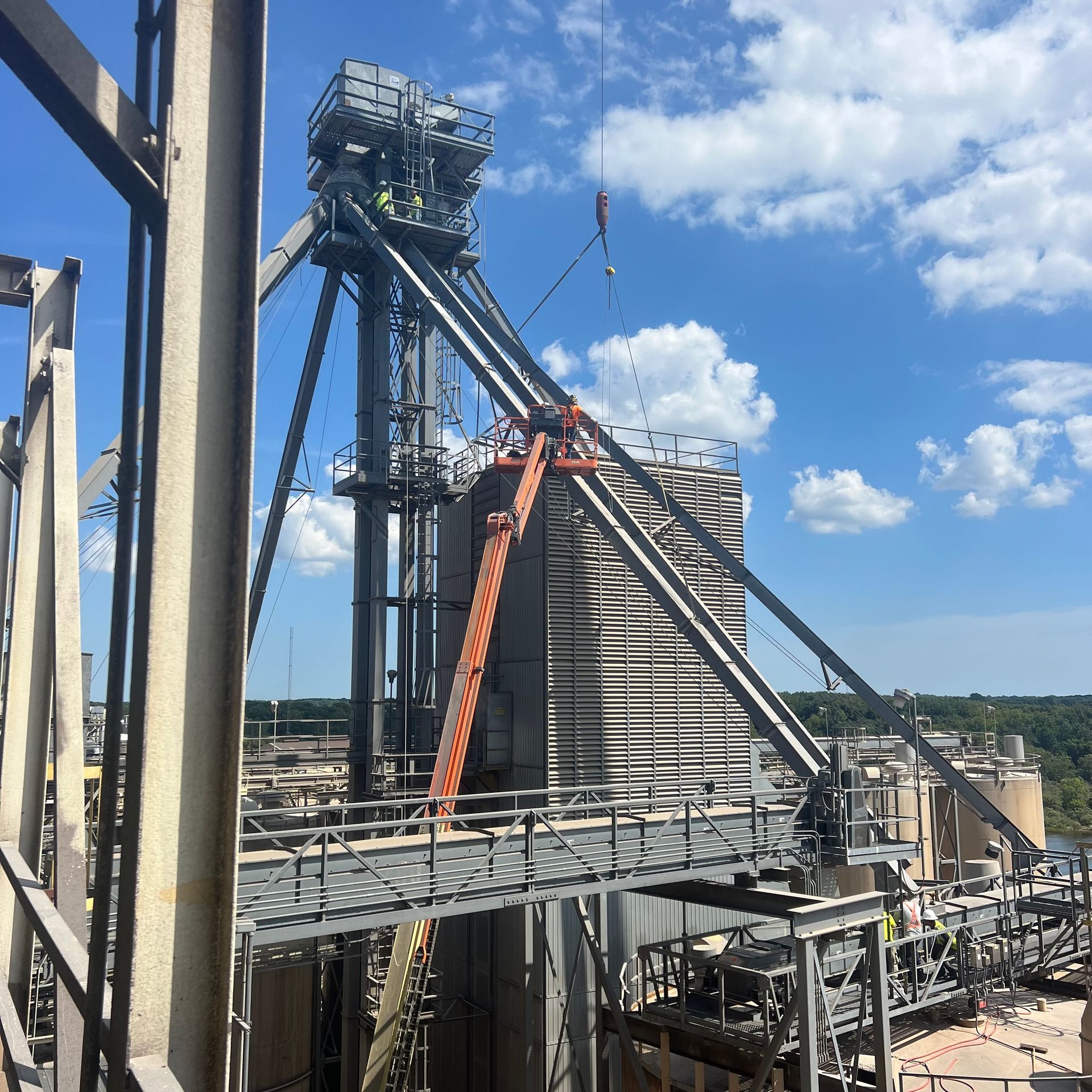 A large building with a crane on top of it