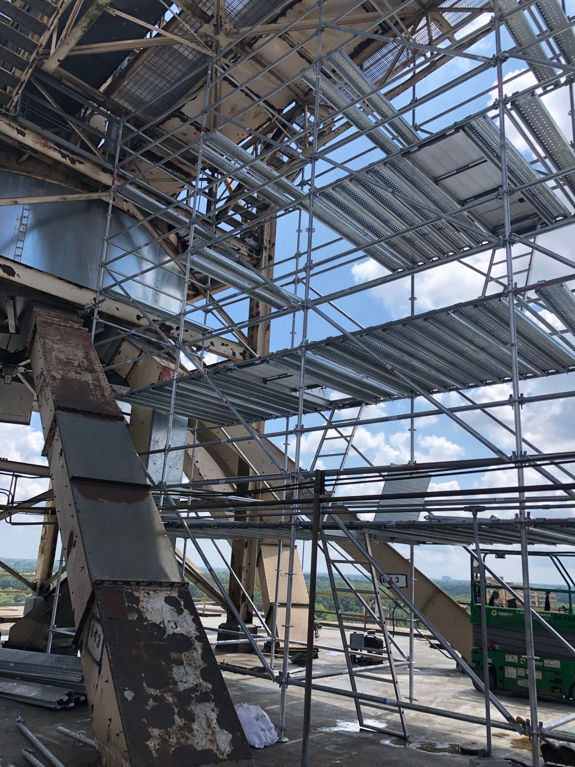 A large building is being built with scaffolding around it