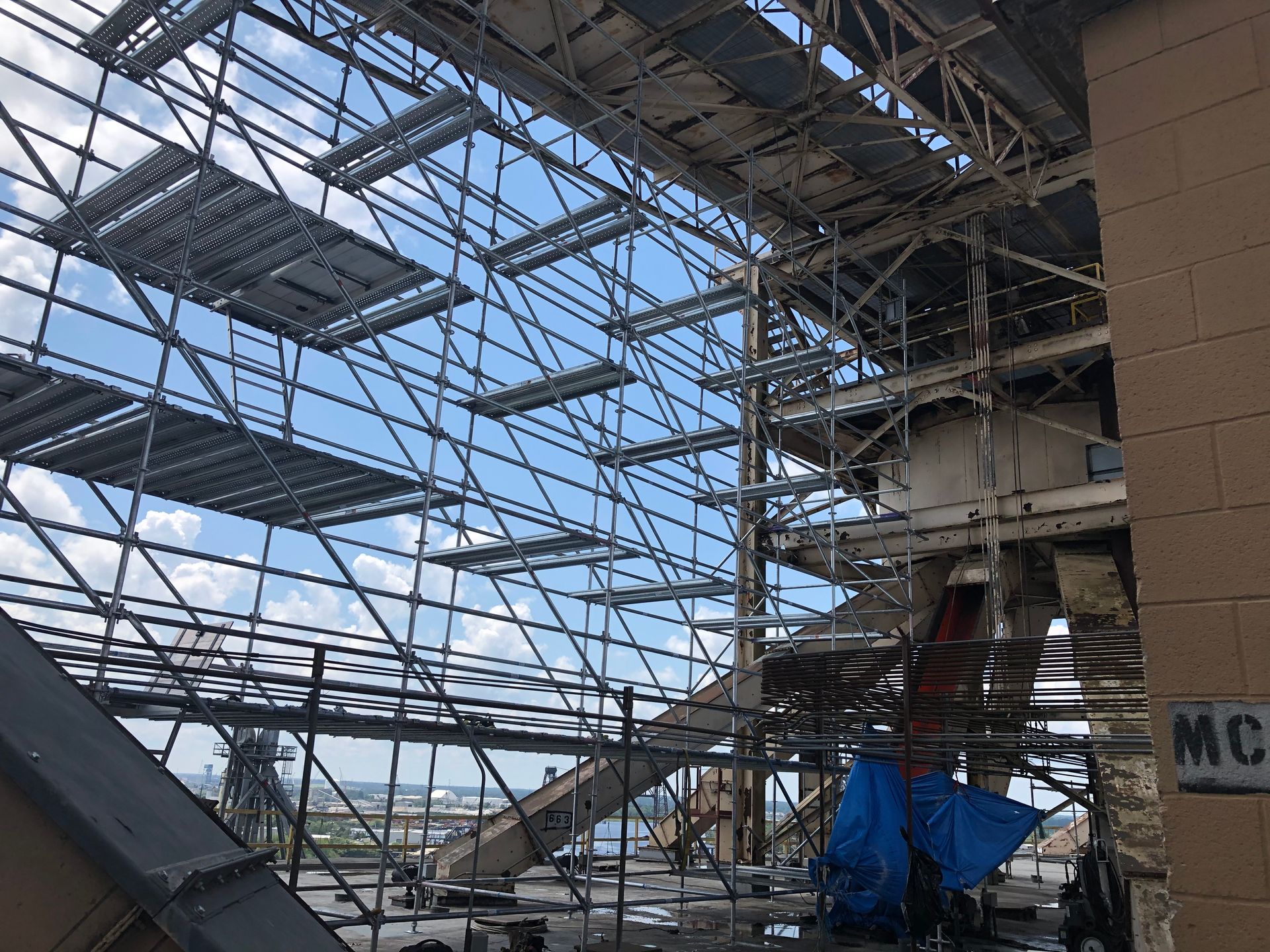 A large building under construction with a lot of scaffolding