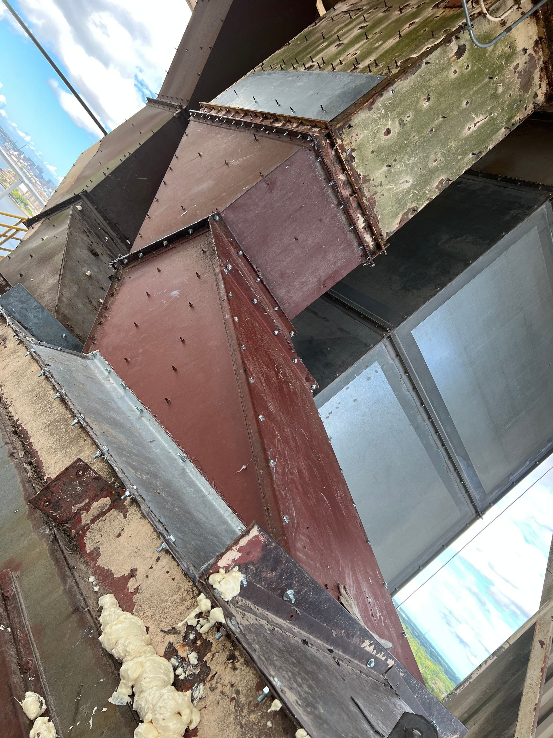 A bunch of pieces of metal are stacked on top of each other