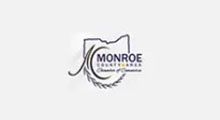 Monroe County, Ohio Chamber of Commerce logo with state outline, text, and decorative elements.