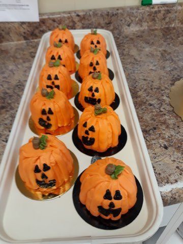 pumpkin cupcakes in a tray