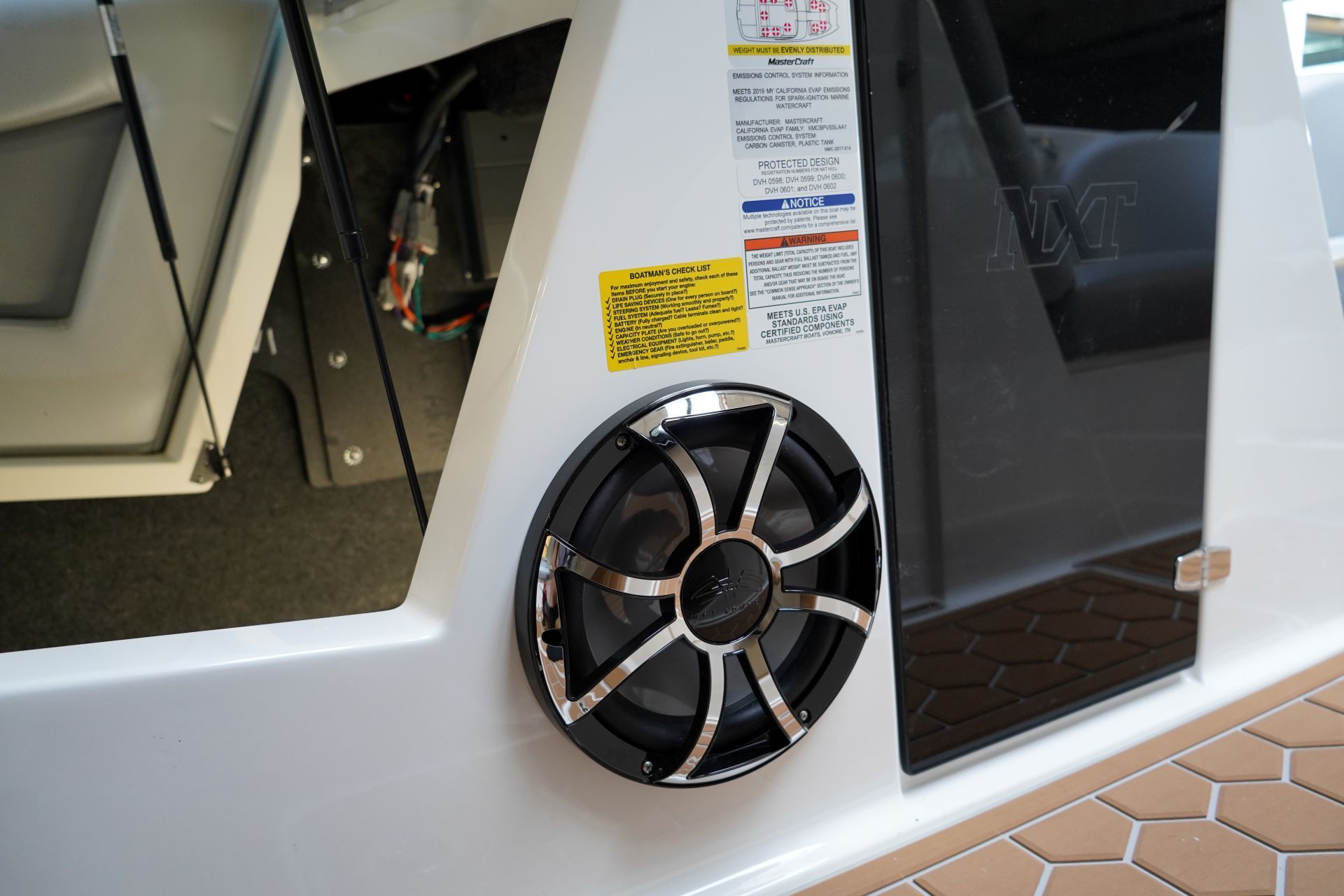 A boat with a speaker on the side of it