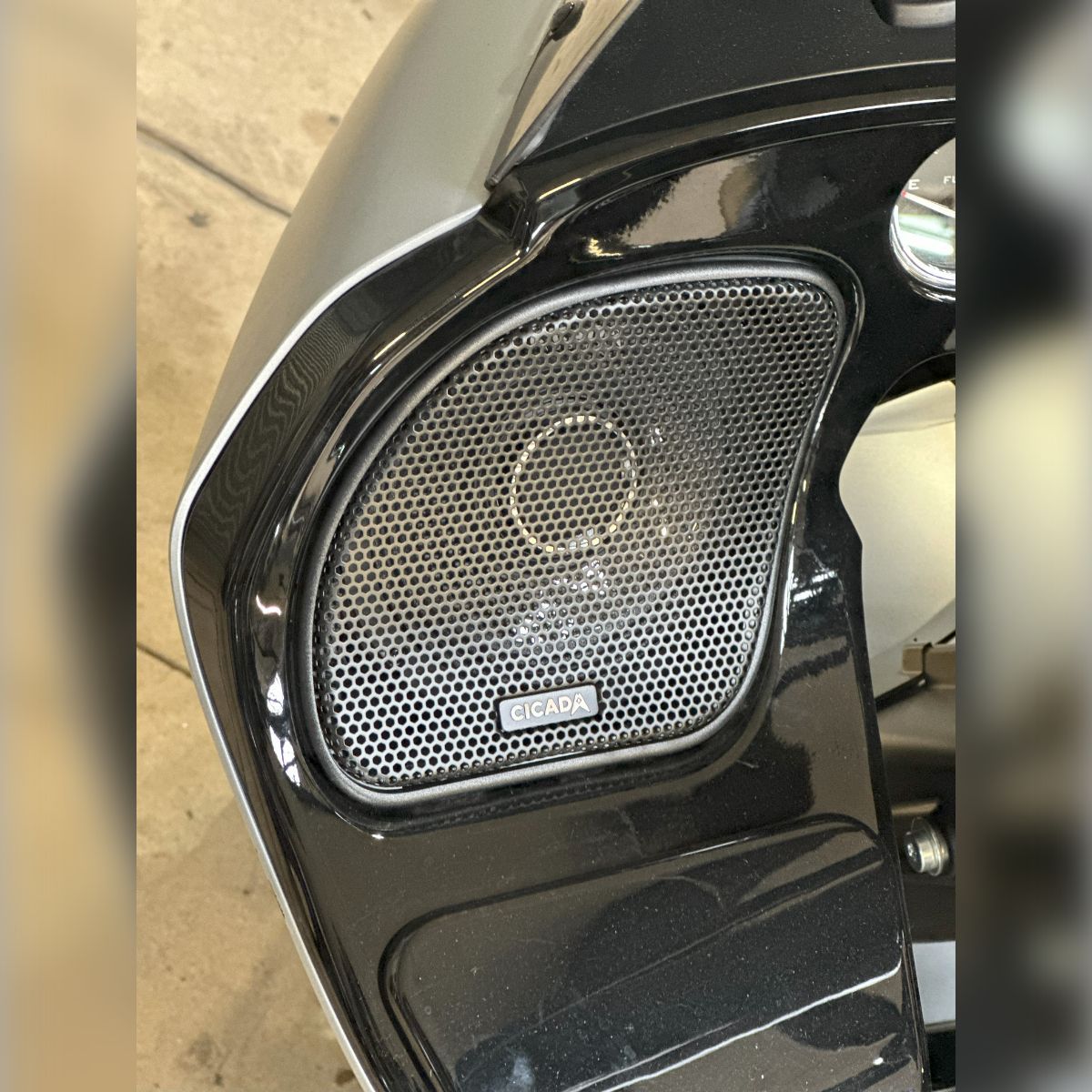 A close up of a speaker on a motorcycle