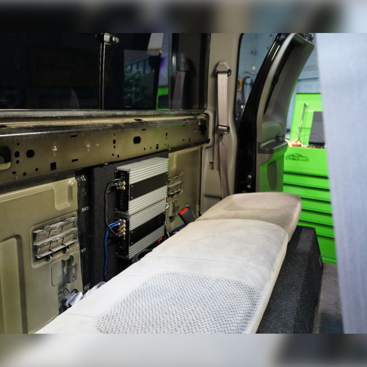 A blurred image of the inside of a vehicle