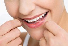 Cleaning teeth using dental floss