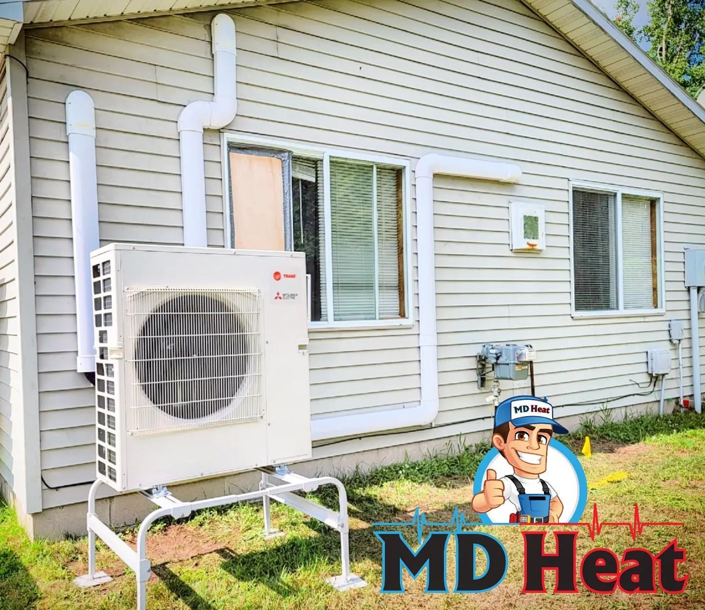 A md heat logo is on the side of a house