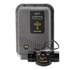 Jandy TruClear salt water pool chlorinator; gray control box and black cell with pipes.