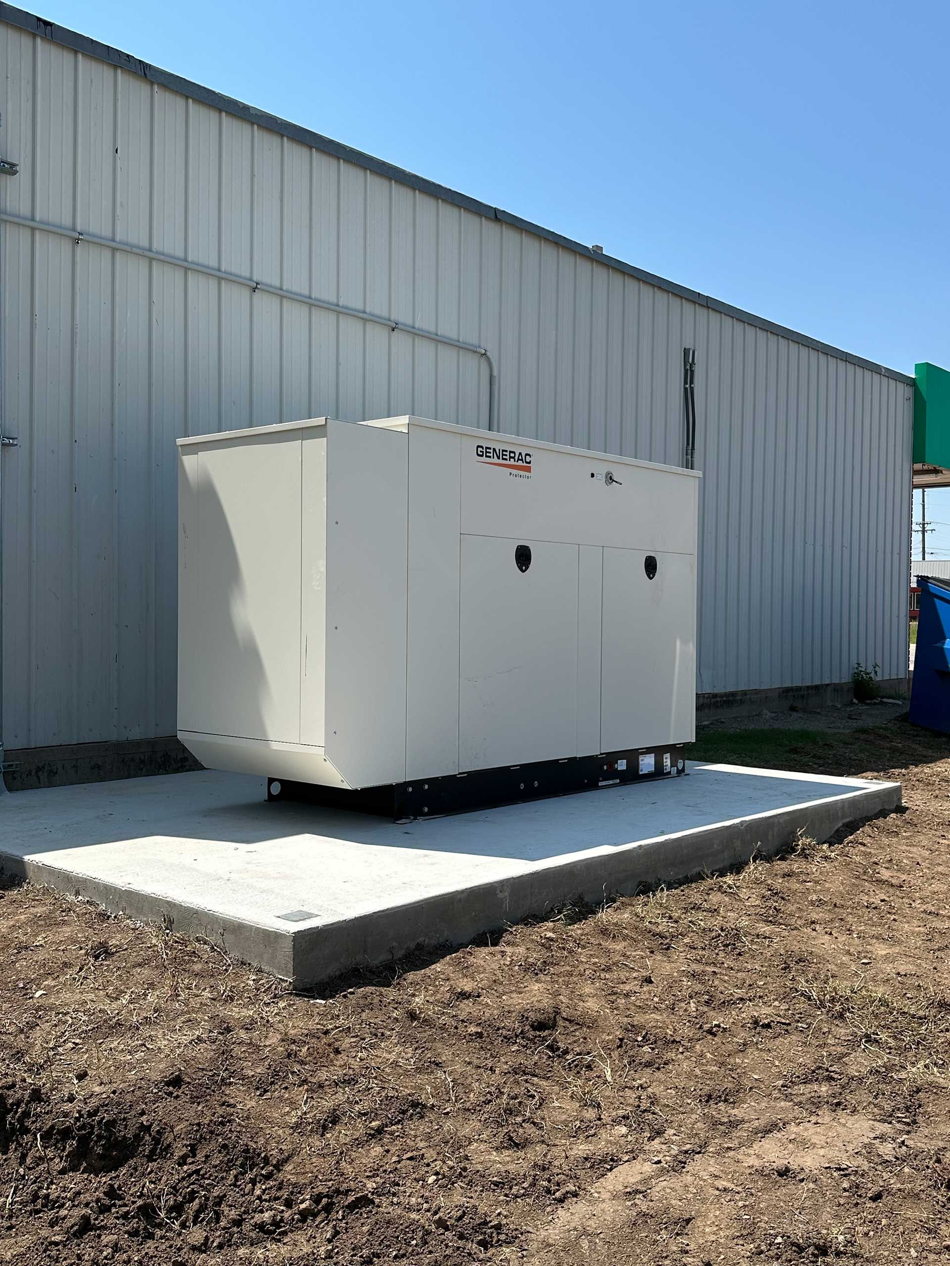 a commercial generator in front of a building