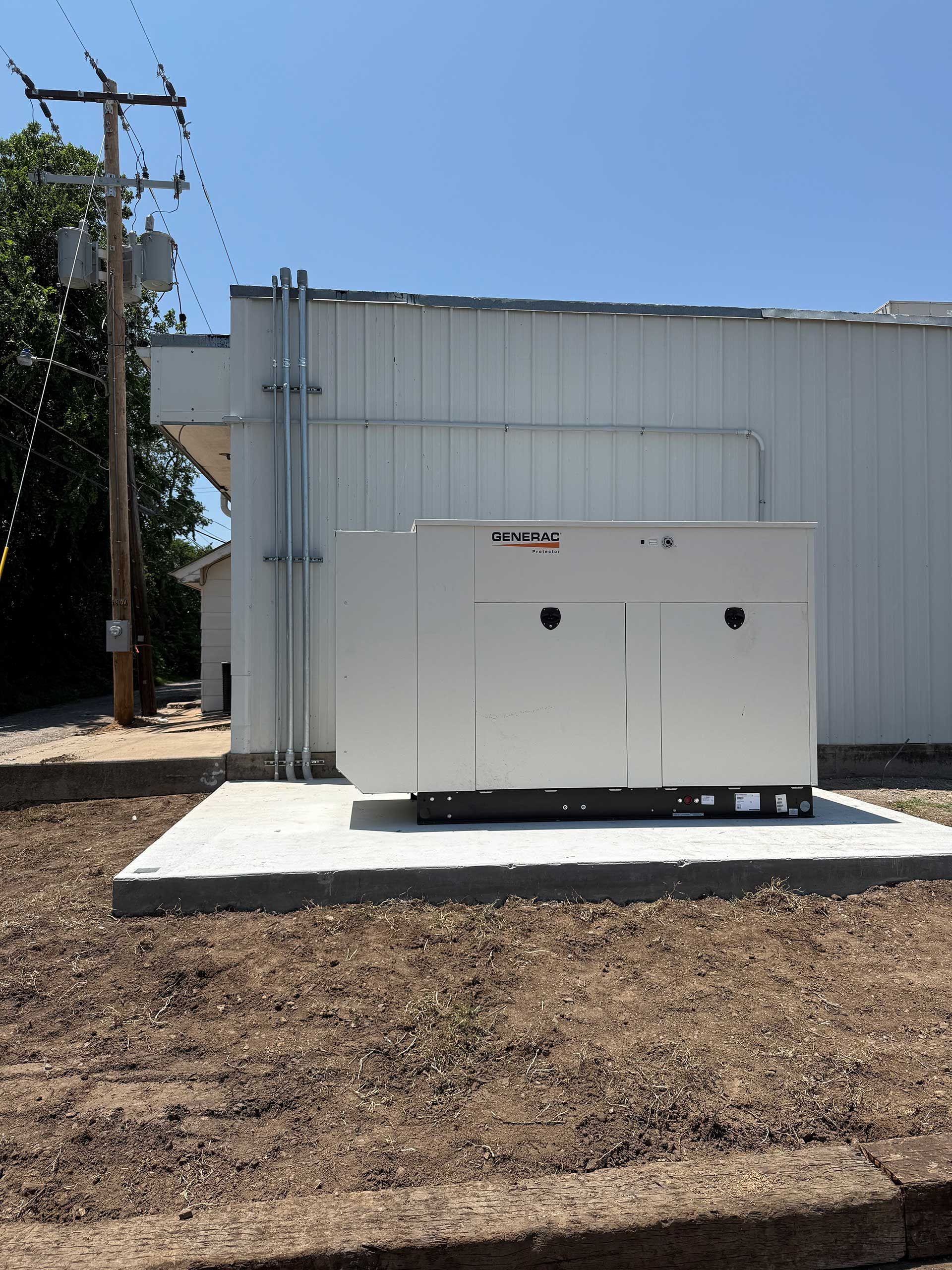 a commercial generator in front of a building