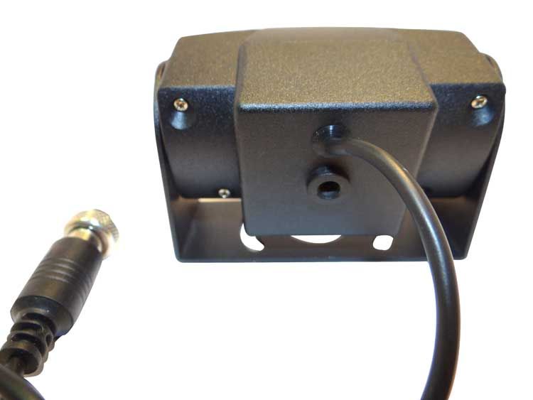 Black security camera with a BNC connector cable, mounted on a metal bracket.