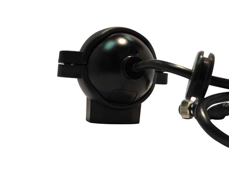 Black round camera head with attached black cable and clamp, against a white background.