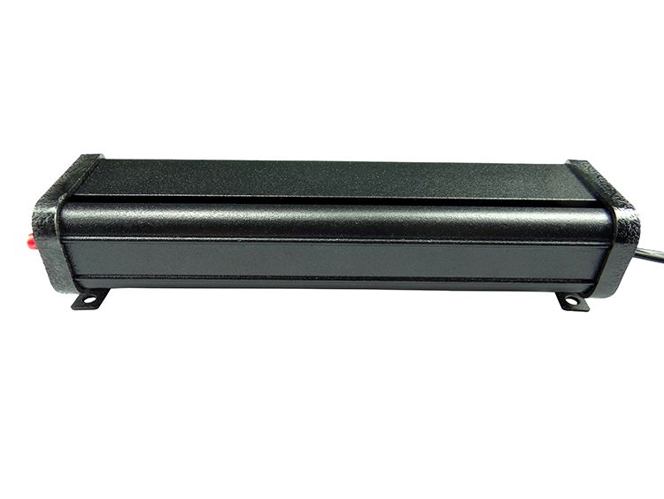 Black rectangular metal power supply with brackets and a red light.