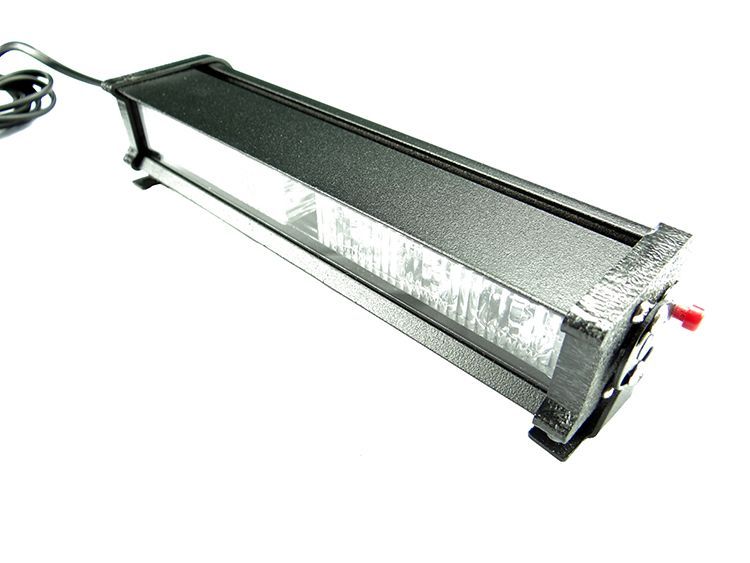 Black rectangular LED light bar with a red switch and a power cable against a white background.