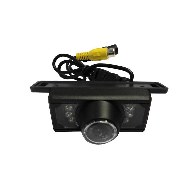 Black car backup camera with yellow video cable and LED lights.