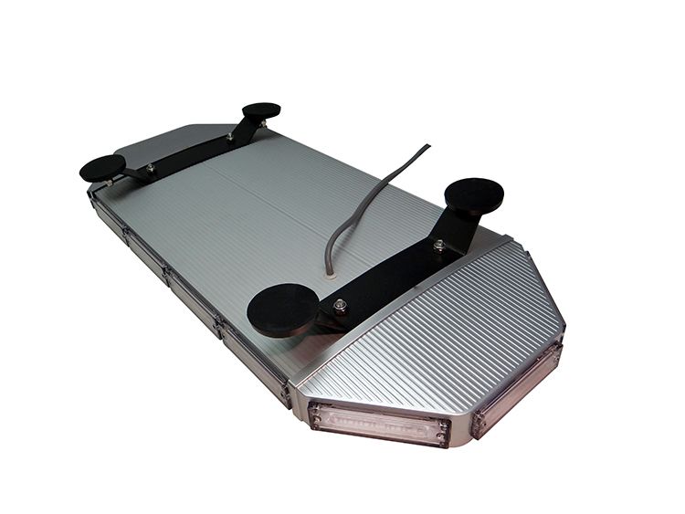 Silver emergency light bar with black mounting feet and wire.