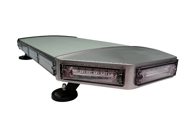 Emergency vehicle light bar, silver and white, mounted on a black roof.