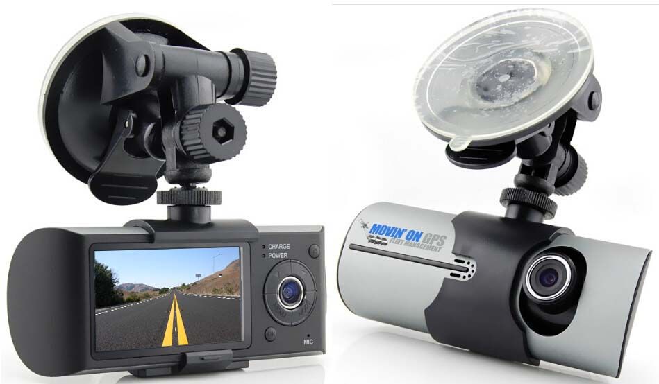 Two dash cams mounted on windshields, one black with screen showing road, one gray.