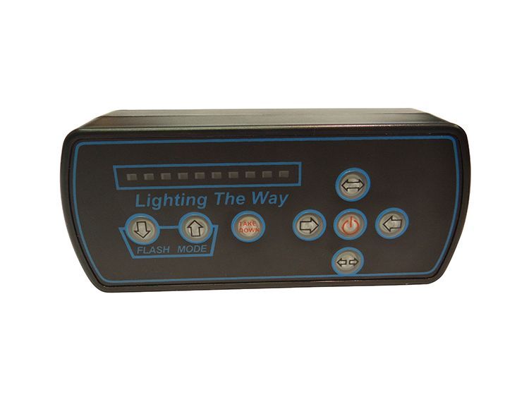 Black control panel with buttons, text 