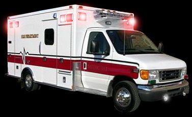 White ambulance with red stripe and flashing lights, on a dark background.