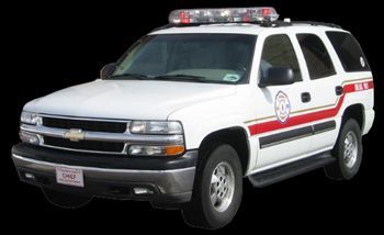 White Chevrolet Tahoe with red and black stripes and emergency lights, possibly a fire or EMS vehicle.