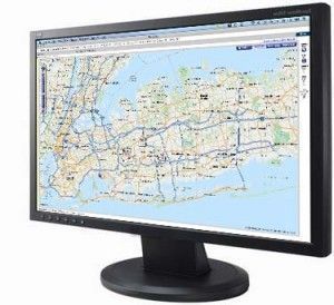A computer monitor displaying a detailed map of a city, likely New York. The screen is black.