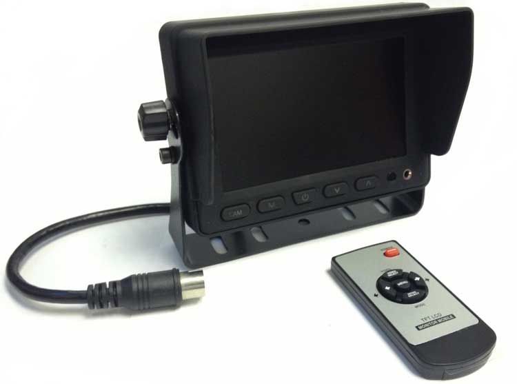 Black monitor with sun visor, attached to a black metal bracket. A remote control and cable sit nearby.