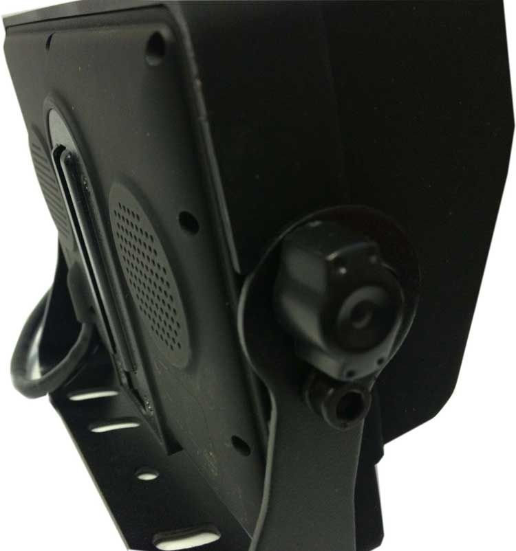 Black monitor with attached camera and stand, angled view.