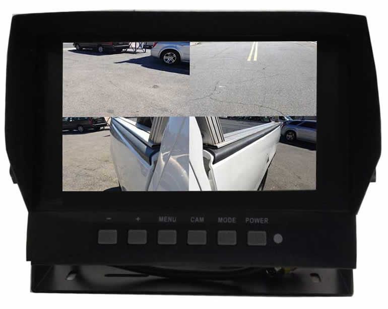 A black monitor displaying three camera views: pavement, vehicle, and truck bed.