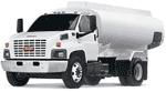 White GMC fuel tanker truck.