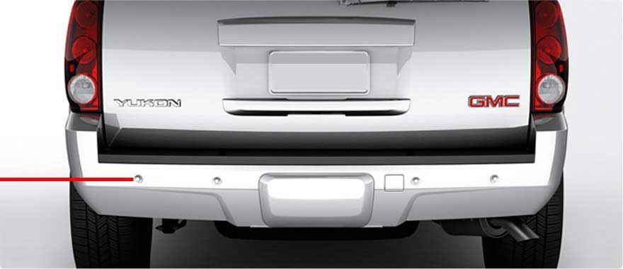 Rear view of a silver GMC Yukon SUV with the red 