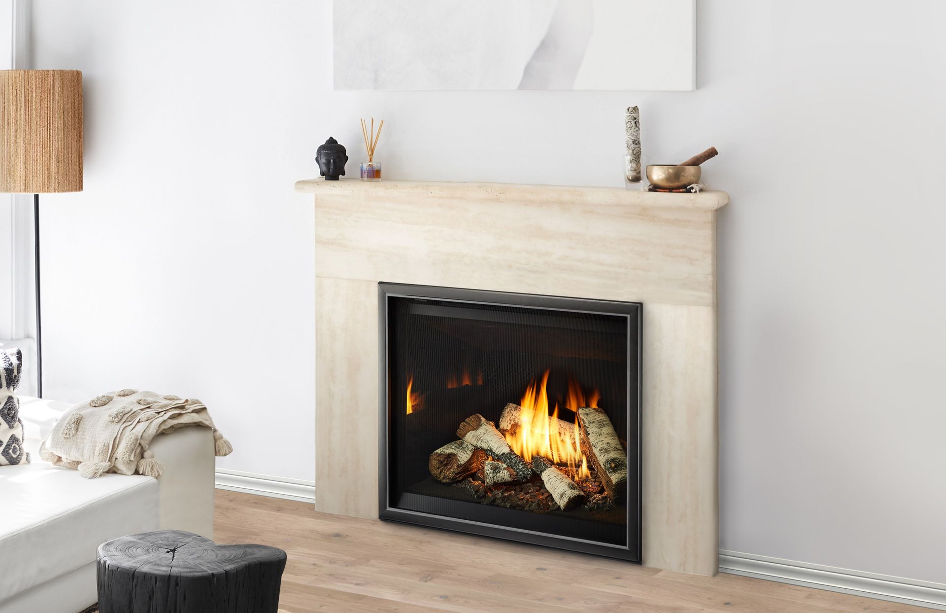 A living room with a fireplace and a couch.