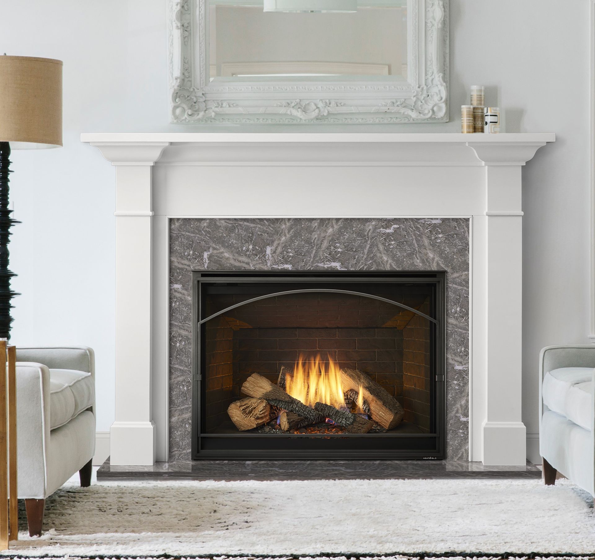 A living room with a fireplace and a lamp