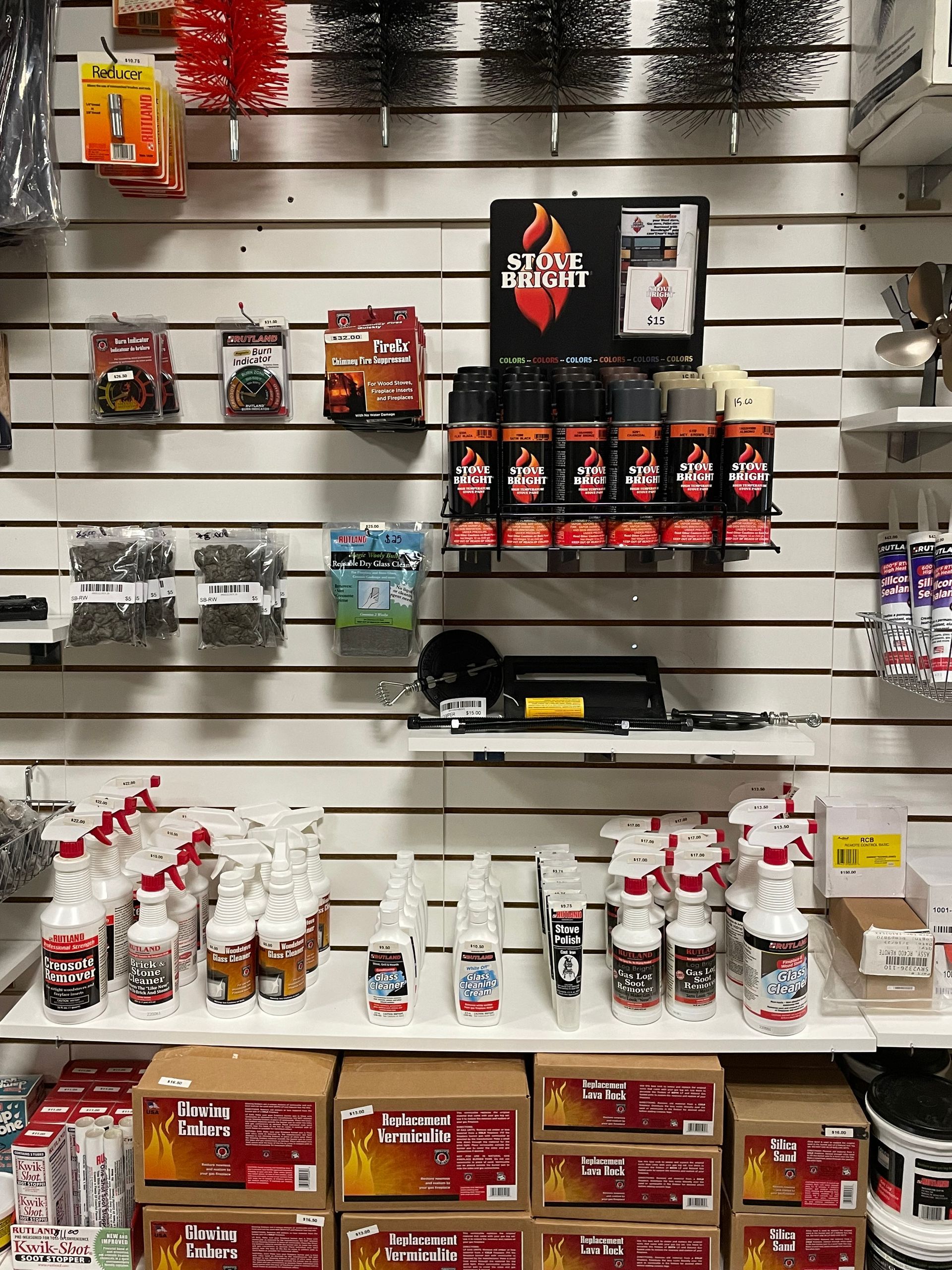 A wall filled with lots of bottles and boxes of products