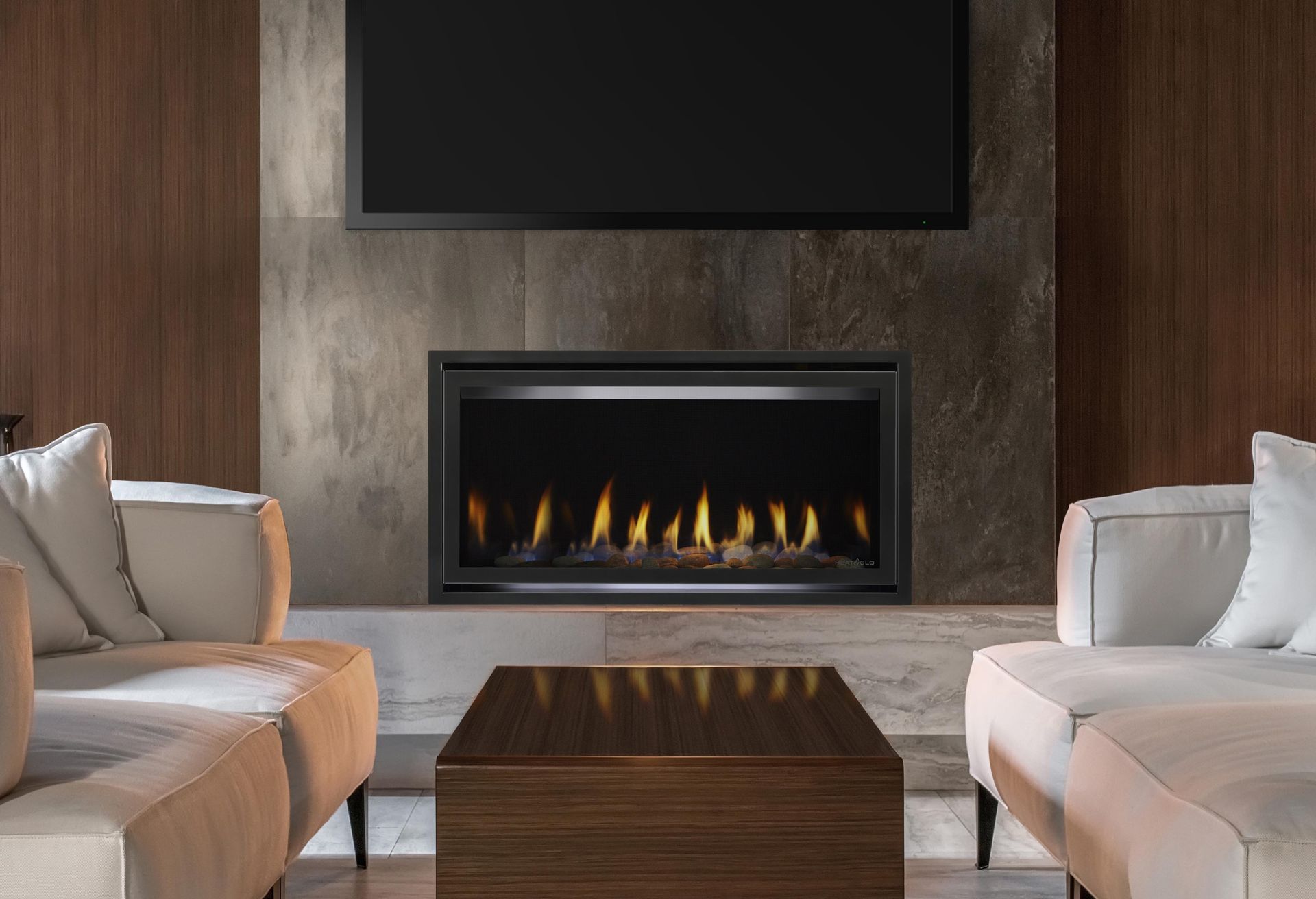 A living room with a fireplace and a flat screen tv.