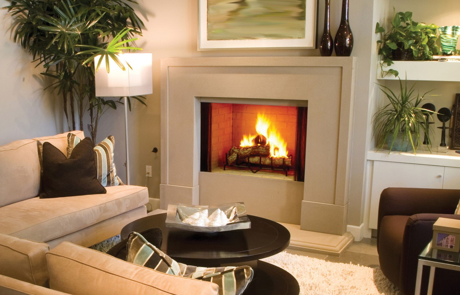 A living room with a fireplace and a couch