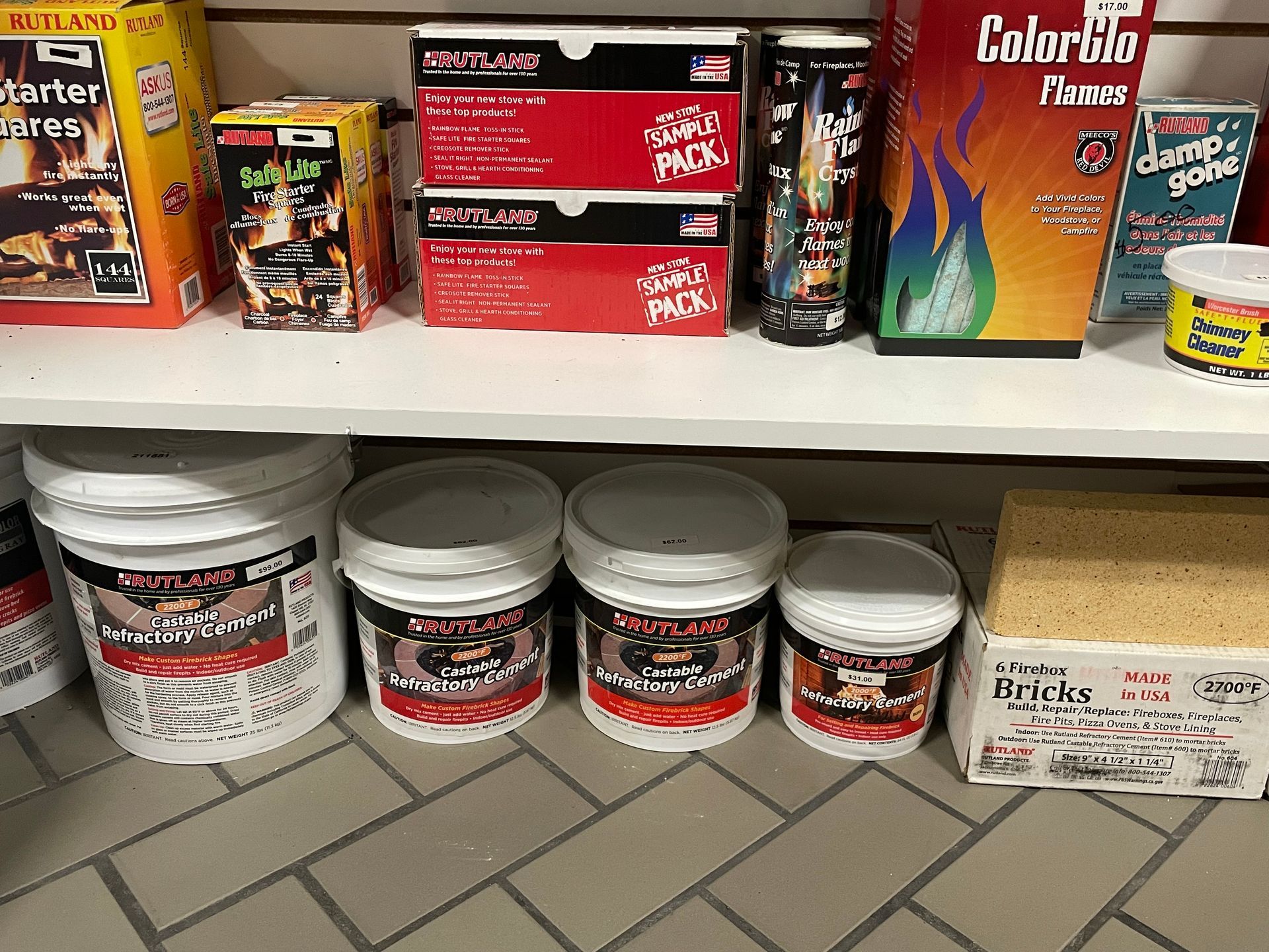 A shelf filled with buckets and boxes of food