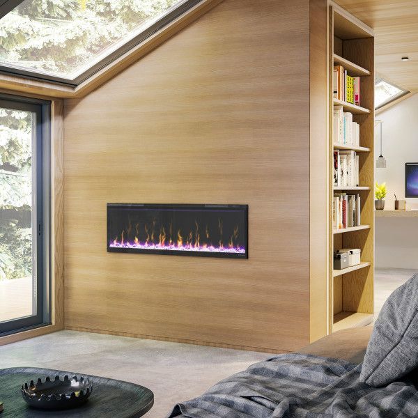 A living room with a fireplace and a bookshelf
